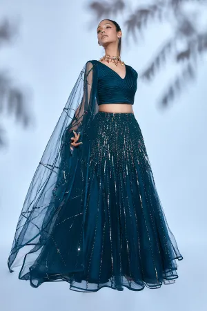 Teal Blouse paired with Teal Hand-embroidered Lehenga and Teal Hand-embroidered Dupatta